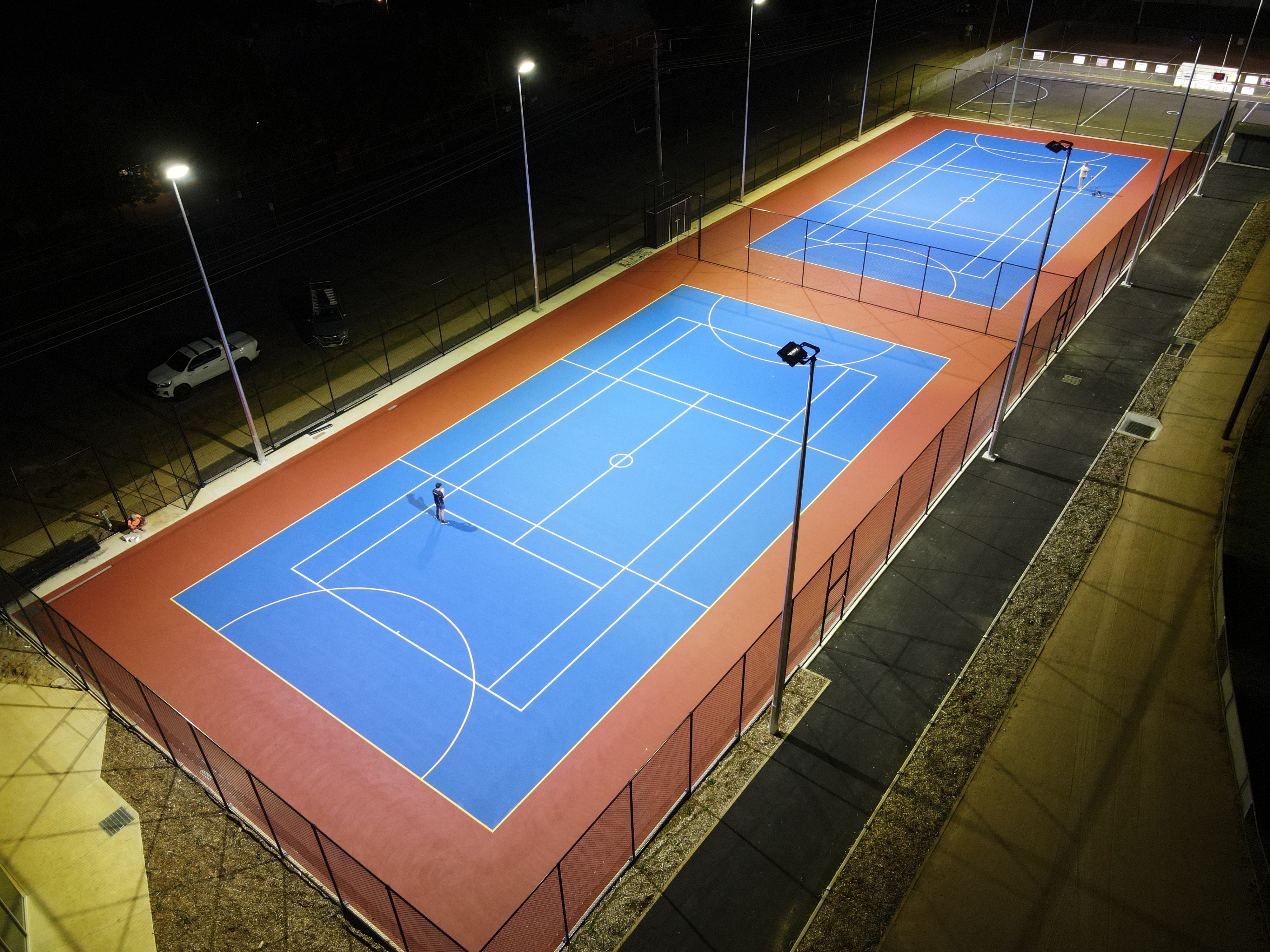 Floodlit tennis and netball courts delivered by RMS Groundworks
